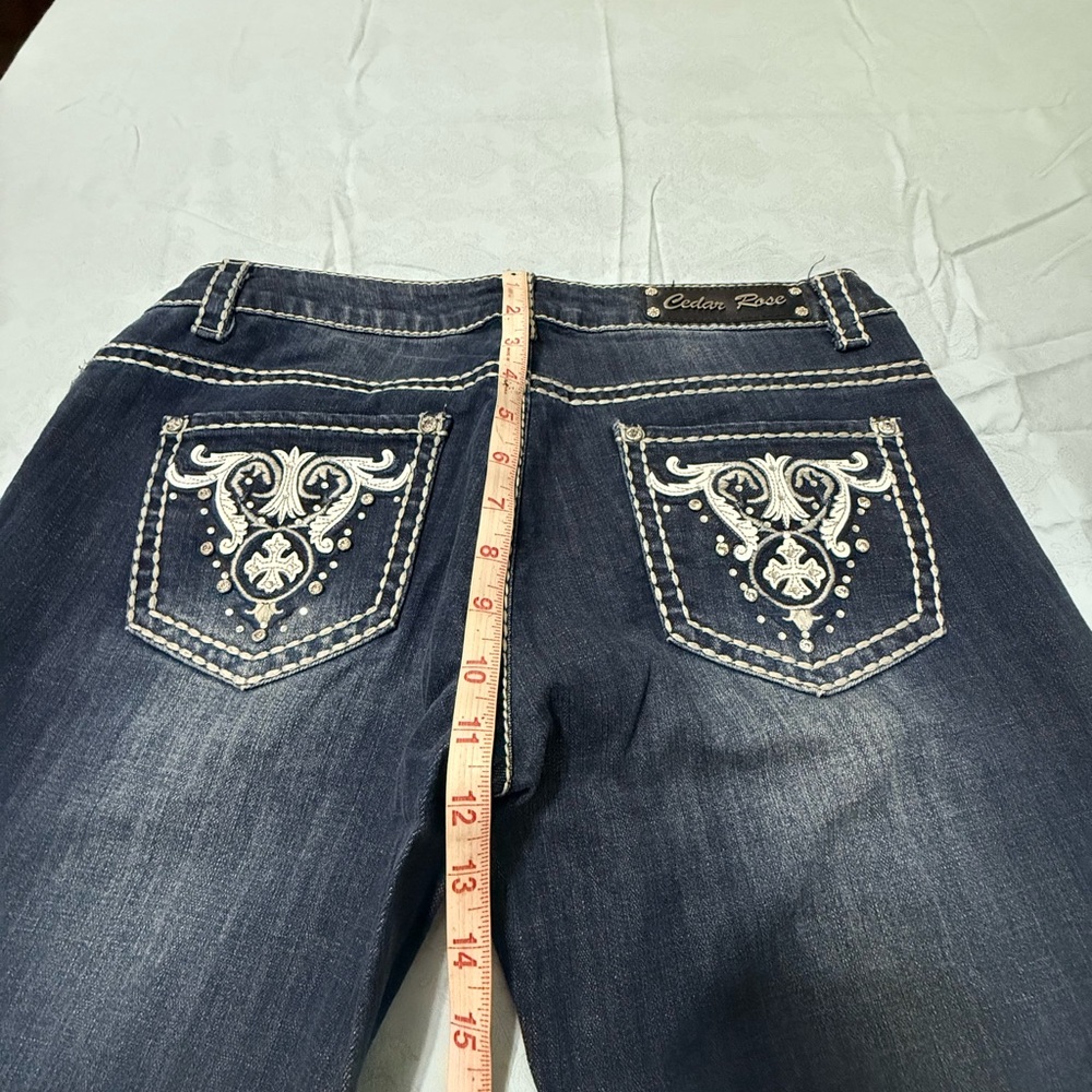 Blue Boot Cut Jeans with Decorative Stitching